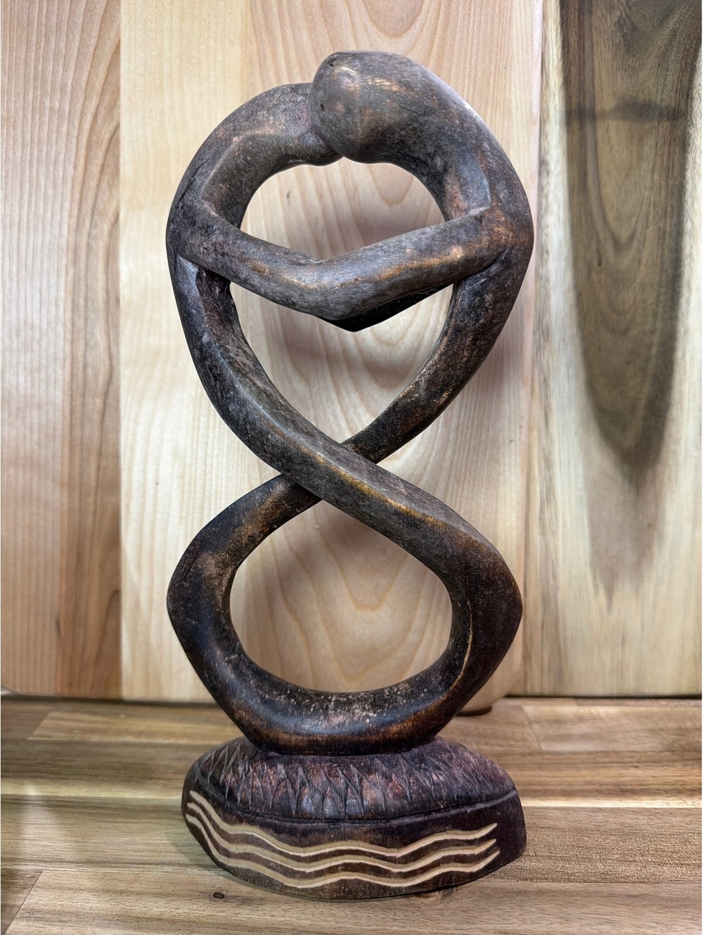 Handcrafted Wooden Sculpture of Embracing Figures